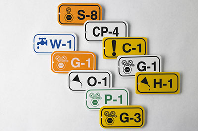 A set of 10 diverse energy source signs, each uniquely illustrating the different methods for identifying various types of energy.